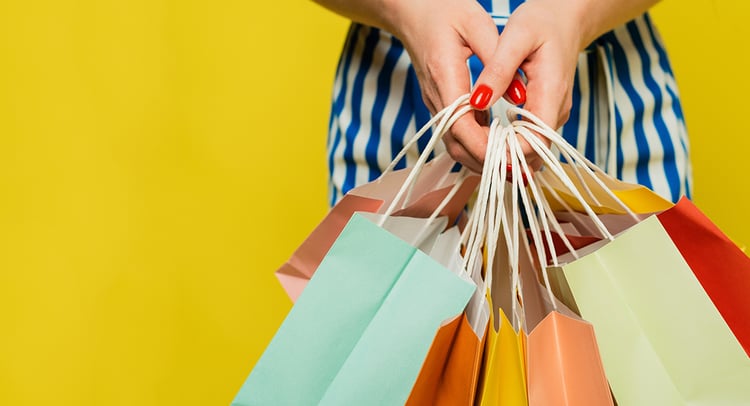 woman-holds-different-colored-bags-with-groceries-various-purchases-her-hands-concept-shopping-sale-web-banner